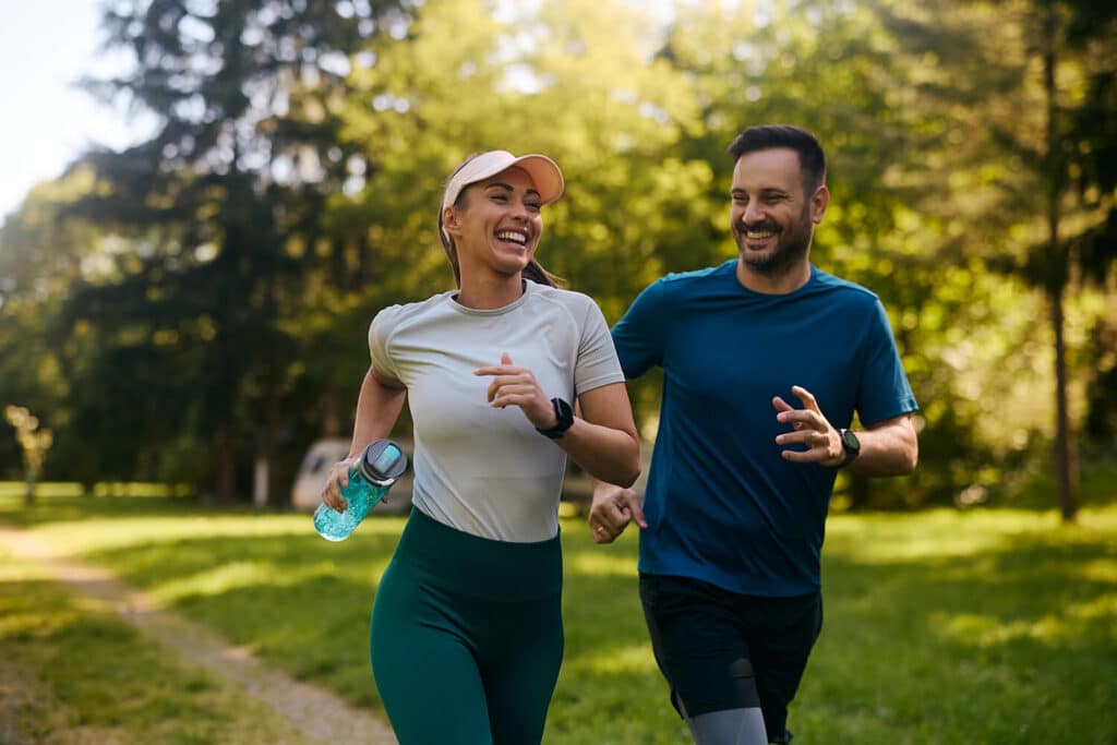 Active couple jogging