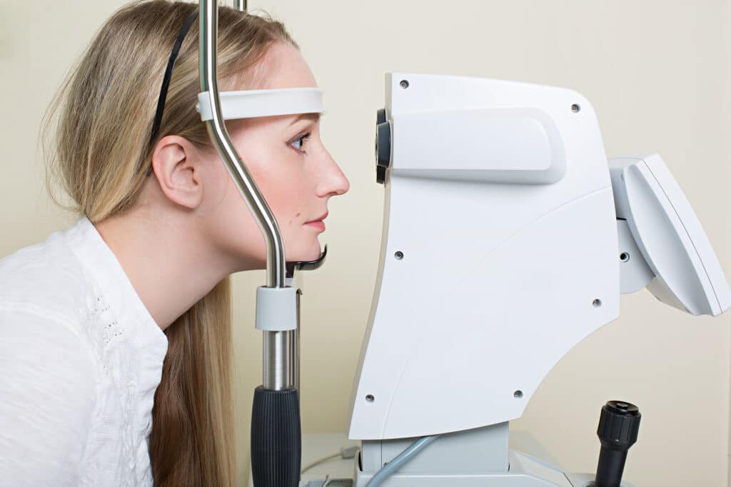 Woman having her eyes examined