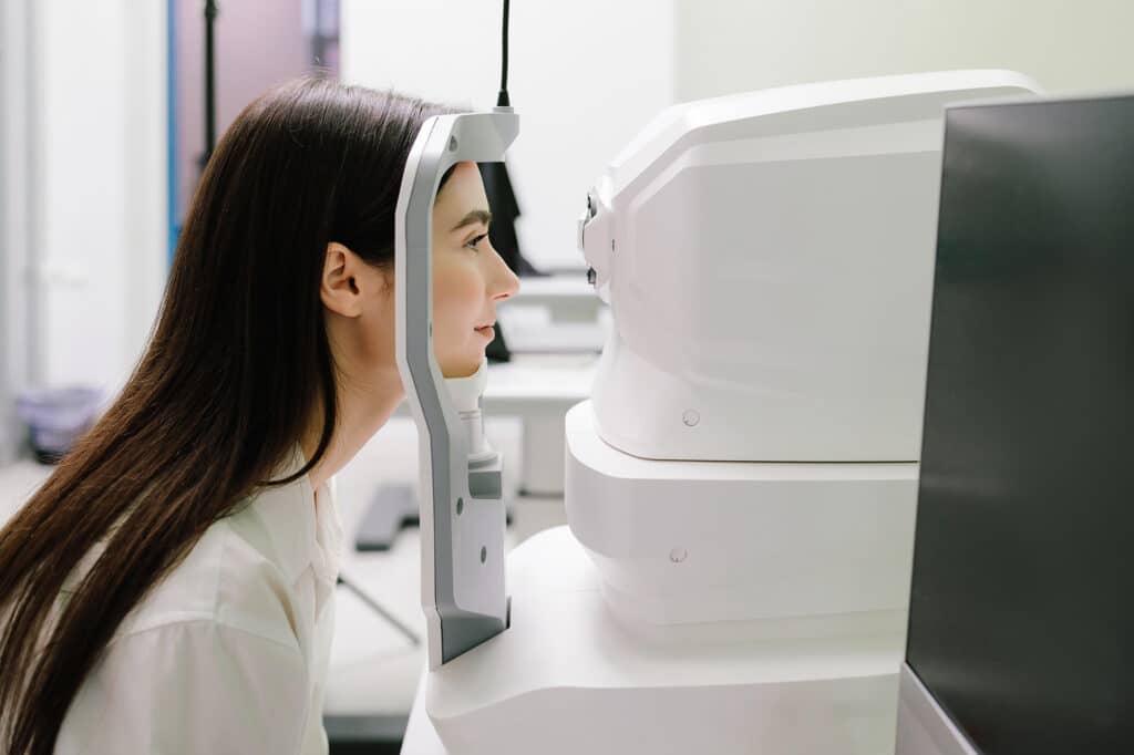Woman having her eyes examined
