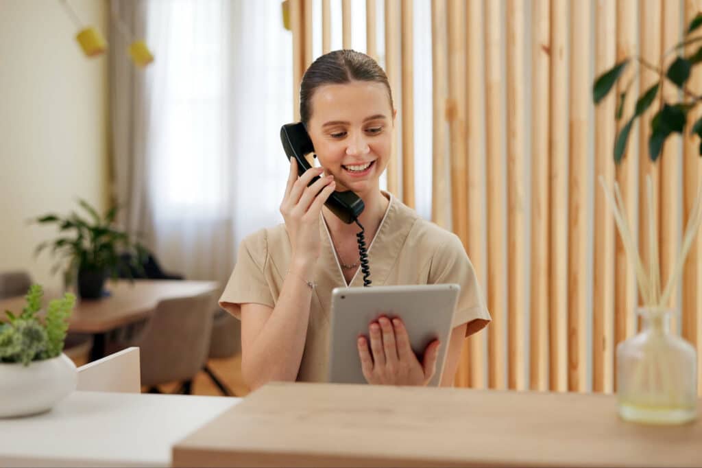 Professional woman working a front desk